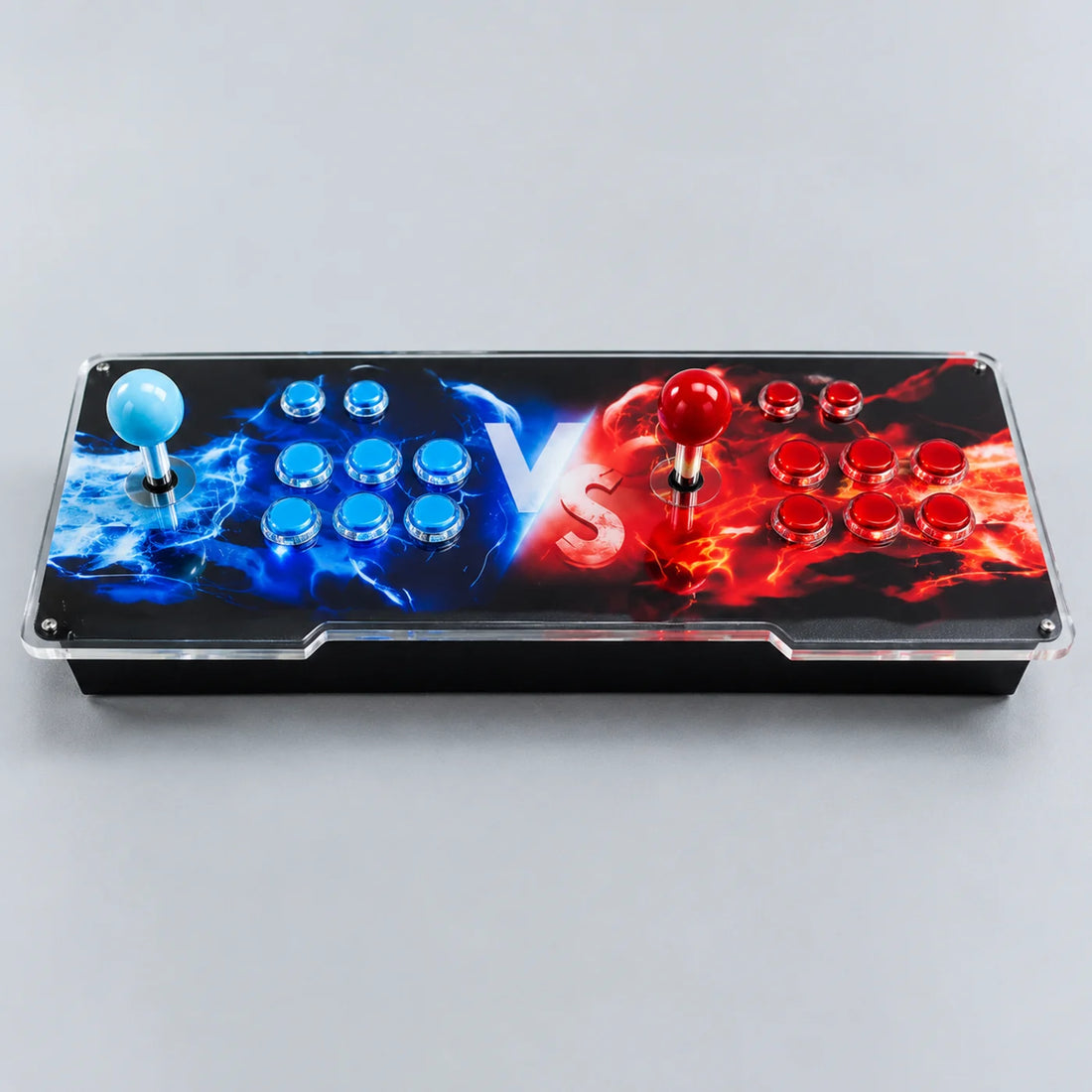 Gros plan sur le joystick à boule bleu clair et les boutons translucides de la console arcade TV T2
